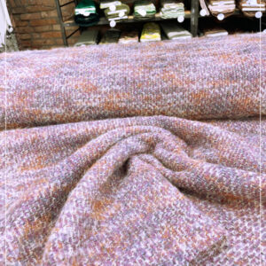 kuschliger, pastelliger Boucle eines bekannten ital. Modelabels